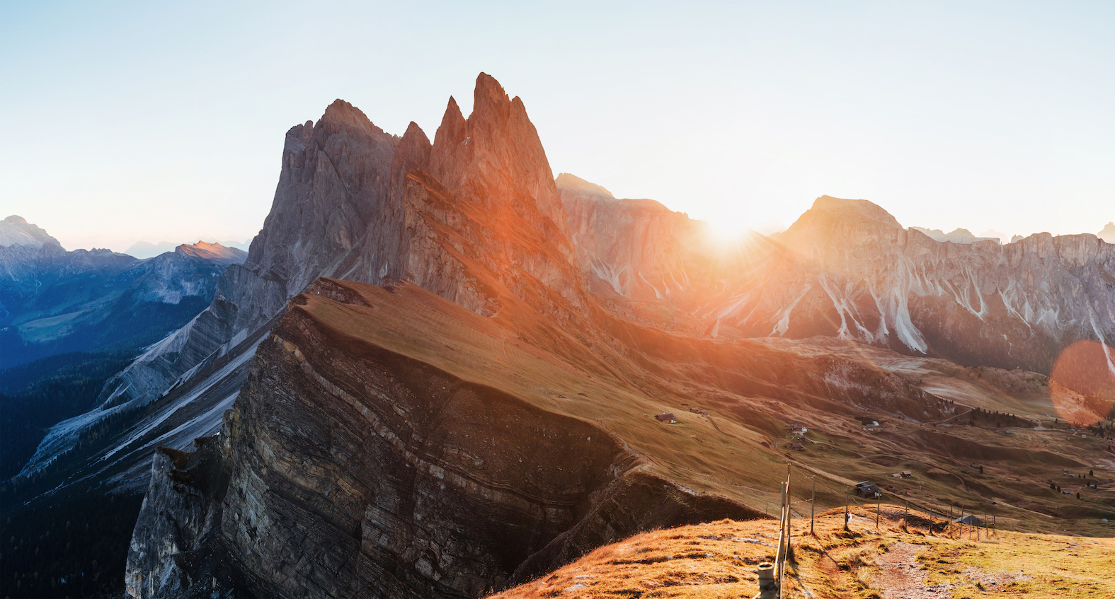 Gorgeous sunset. Outstanding landscape of the majestic Seceda dolomite mountains at daytime. Panoramic photo